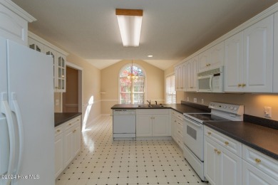 This charming ranch-style, brick home is located on a quiet on Beacon Ridge Golf and Country Club in North Carolina - for sale on GolfHomes.com, golf home, golf lot