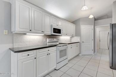 Welcome to this beautifully maintained 3-bedroom, 2-bathroom on The Golf Club At Cypress Head in Florida - for sale on GolfHomes.com, golf home, golf lot