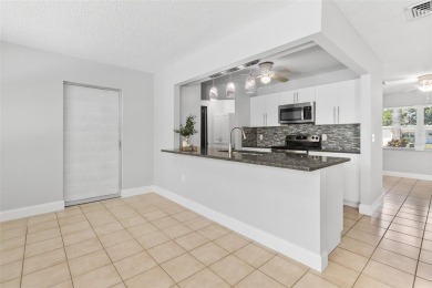 One or more photo(s) has been virtually staged. This home has on Jacaranda West Country Club in Florida - for sale on GolfHomes.com, golf home, golf lot