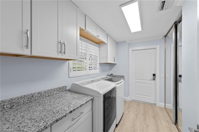 Welcome to 5785 Drummond Way, an exquisitely remodeled residence on Arrowhead Golf Club At Heritage Greens in Florida - for sale on GolfHomes.com, golf home, golf lot