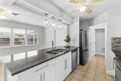 One or more photo(s) has been virtually staged. This home has on Jacaranda West Country Club in Florida - for sale on GolfHomes.com, golf home, golf lot