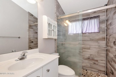 Welcome to this beautifully maintained 3-bedroom, 2-bathroom on The Golf Club At Cypress Head in Florida - for sale on GolfHomes.com, golf home, golf lot