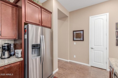 Discover this gorgeous model-perfect home nestled in the heart on Verrado Golf Club  in Arizona - for sale on GolfHomes.com, golf home, golf lot