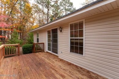 This charming ranch-style, brick home is located on a quiet on Beacon Ridge Golf and Country Club in North Carolina - for sale on GolfHomes.com, golf home, golf lot