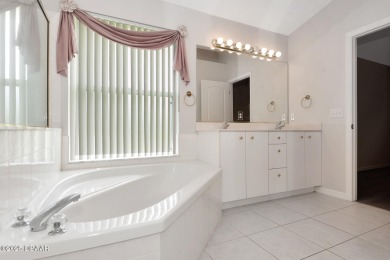 Welcome to this beautifully maintained 3-bedroom, 2-bathroom on The Golf Club At Cypress Head in Florida - for sale on GolfHomes.com, golf home, golf lot