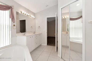 Welcome to this beautifully maintained 3-bedroom, 2-bathroom on The Golf Club At Cypress Head in Florida - for sale on GolfHomes.com, golf home, golf lot