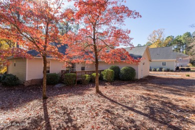 This charming ranch-style, brick home is located on a quiet on Beacon Ridge Golf and Country Club in North Carolina - for sale on GolfHomes.com, golf home, golf lot