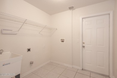 Welcome to this beautifully maintained 3-bedroom, 2-bathroom on The Golf Club At Cypress Head in Florida - for sale on GolfHomes.com, golf home, golf lot