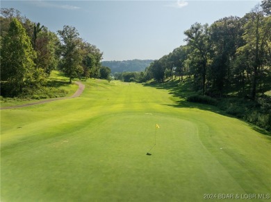 Nestled on Hole #7 of Missouri's only Arnold Palmer Signature on Osage National Golf Club in Missouri - for sale on GolfHomes.com, golf home, golf lot