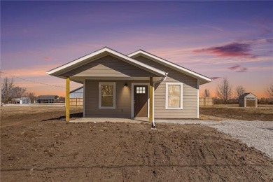 Come and check out this gorgeous new build located within a on Linn Valley Lakes - Deer Trace Golf Course in Kansas - for sale on GolfHomes.com, golf home, golf lot