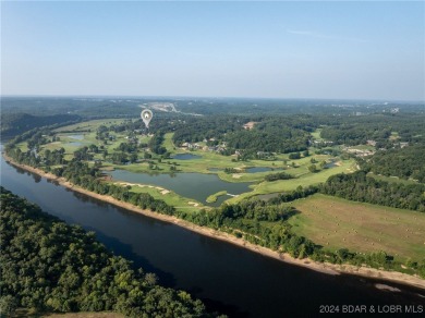 Nestled on Hole #7 of Missouri's only Arnold Palmer Signature on Osage National Golf Club in Missouri - for sale on GolfHomes.com, golf home, golf lot