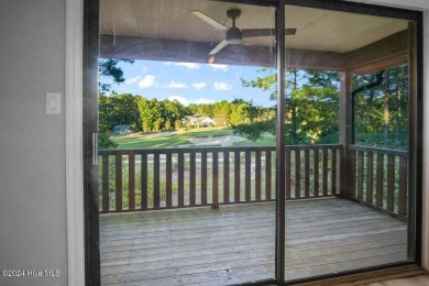 Top-floor condo with stunning views of the 8th hole at Highland on Hyland Golf Club in North Carolina - for sale on GolfHomes.com, golf home, golf lot