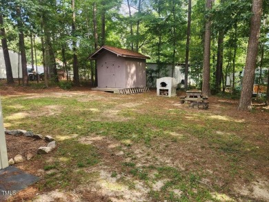 This ready to enjoy property has everything you need for a on River Golf and Country Club at Lake Royale in North Carolina - for sale on GolfHomes.com, golf home, golf lot