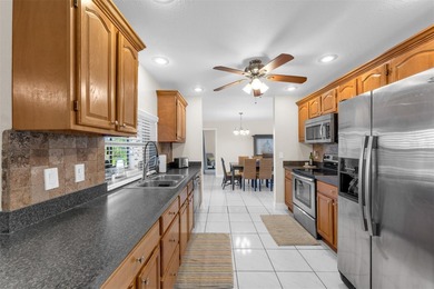 One of a kind, Florida Living, water community. This pool home on Gulf Harbors Golf Course in Florida - for sale on GolfHomes.com, golf home, golf lot