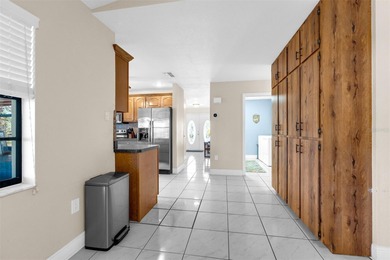 One of a kind, Florida Living, water community. This pool home on Gulf Harbors Golf Course in Florida - for sale on GolfHomes.com, golf home, golf lot