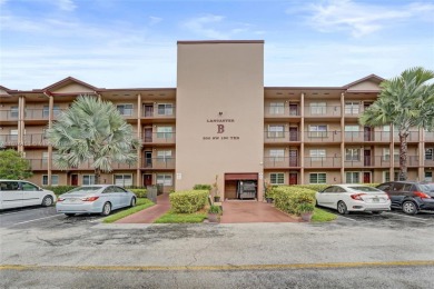ENJOY ENDLESS GOLF COURSE VIEWS FROM YOUR FIRST FLOOR CONDO WITH on  in Florida - for sale on GolfHomes.com, golf home, golf lot