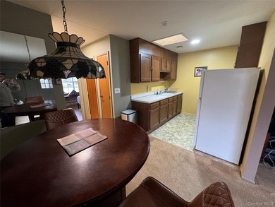 One Bedroom Eton model in Leisure Village a 55+ active community on Leisure Village Golf Course in New York - for sale on GolfHomes.com, golf home, golf lot