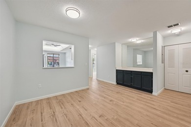 Your vacation doesn't have to end!  This freshly and completely on Capri Isle Golf Club in Florida - for sale on GolfHomes.com, golf home, golf lot