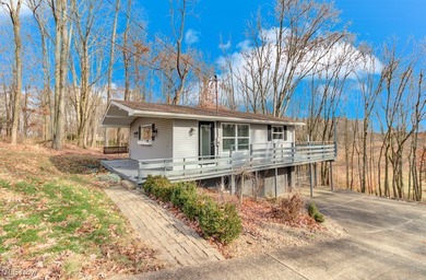 Welcome to your cozy Lake Mohawk retreat! This updated home sits on Lake Mohawk Golf Club in Ohio - for sale on GolfHomes.com, golf home, golf lot