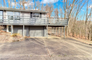 Welcome to your cozy Lake Mohawk retreat! This updated home sits on Lake Mohawk Golf Club in Ohio - for sale on GolfHomes.com, golf home, golf lot