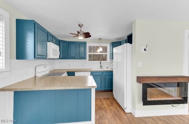 Welcome to your cozy Lake Mohawk retreat! This updated home sits on Lake Mohawk Golf Club in Ohio - for sale on GolfHomes.com, golf home, golf lot