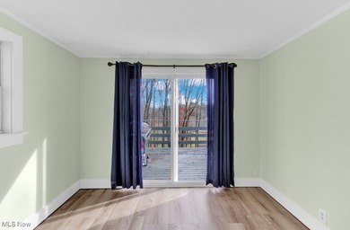 Welcome to your cozy Lake Mohawk retreat! This updated home sits on Lake Mohawk Golf Club in Ohio - for sale on GolfHomes.com, golf home, golf lot