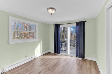 Welcome to your cozy Lake Mohawk retreat! This updated home sits on Lake Mohawk Golf Club in Ohio - for sale on GolfHomes.com, golf home, golf lot