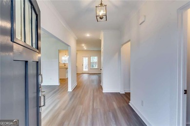 Experience modern comfort and timeless design at 215 Preserve on Traditions of Braselton Golf Club in Georgia - for sale on GolfHomes.com, golf home, golf lot