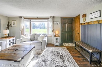 Nestled on an amazing nearly one-acre lot, this beautifully on Prairie Creek Golf Course in Michigan - for sale on GolfHomes.com, golf home, golf lot