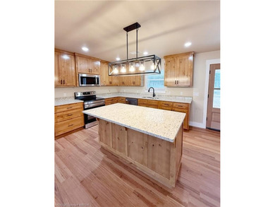 Come along with me and walk into this Brand New Construction on on Wolf Ridge Golf Course in Oklahoma - for sale on GolfHomes.com, golf home, golf lot