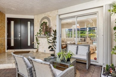 WELCOME TO YOUR DREAM HOME IN THE DESIRABLE DORAL GLEN COMMUNITY on Jim McLean Signature Course in Florida - for sale on GolfHomes.com, golf home, golf lot