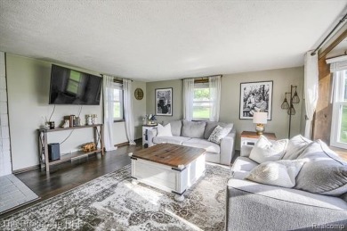 Nestled on an amazing nearly one-acre lot, this beautifully on Prairie Creek Golf Course in Michigan - for sale on GolfHomes.com, golf home, golf lot