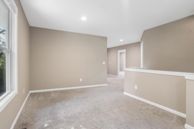 Spacious and updated, this 5-bedroom, 2-bathroom home offers 2 on IMA Brookwood Golf Course in Michigan - for sale on GolfHomes.com, golf home, golf lot
