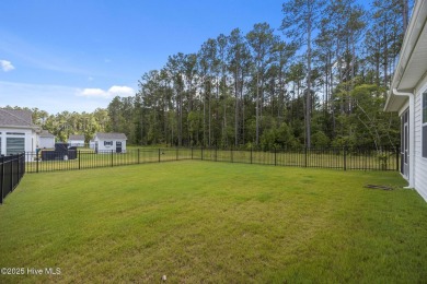 Tucked away on a quiet street, this elegant one-owner home on Carolina Colours Golf Club in North Carolina - for sale on GolfHomes.com, golf home, golf lot