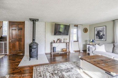 Nestled on an amazing nearly one-acre lot, this beautifully on Prairie Creek Golf Course in Michigan - for sale on GolfHomes.com, golf home, golf lot