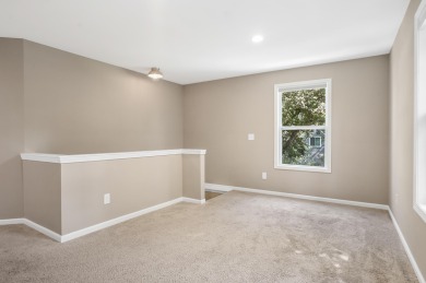 Spacious and updated, this 5-bedroom, 2-bathroom home offers 2 on IMA Brookwood Golf Course in Michigan - for sale on GolfHomes.com, golf home, golf lot