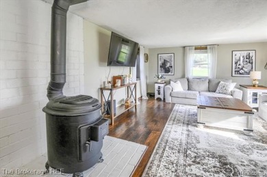 Nestled on an amazing nearly one-acre lot, this beautifully on Prairie Creek Golf Course in Michigan - for sale on GolfHomes.com, golf home, golf lot