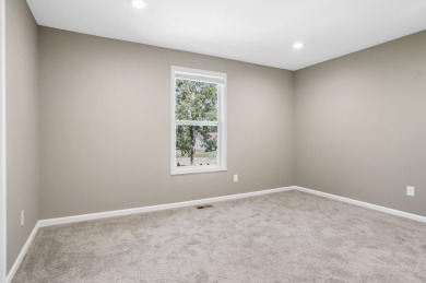 Spacious and updated, this 5-bedroom, 2-bathroom home offers 2 on IMA Brookwood Golf Course in Michigan - for sale on GolfHomes.com, golf home, golf lot