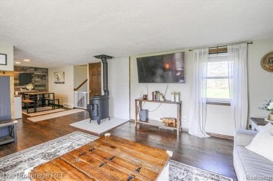 Nestled on an amazing nearly one-acre lot, this beautifully on Prairie Creek Golf Course in Michigan - for sale on GolfHomes.com, golf home, golf lot