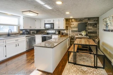 Nestled on an amazing nearly one-acre lot, this beautifully on Prairie Creek Golf Course in Michigan - for sale on GolfHomes.com, golf home, golf lot