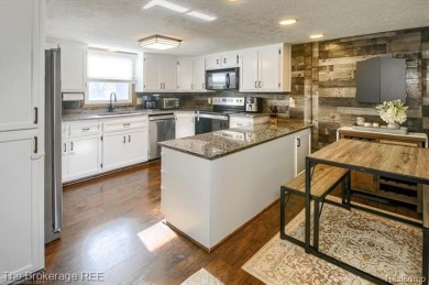 Nestled on an amazing nearly one-acre lot, this beautifully on Prairie Creek Golf Course in Michigan - for sale on GolfHomes.com, golf home, golf lot
