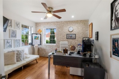 WELCOME TO YOUR DREAM HOME IN THE DESIRABLE DORAL GLEN COMMUNITY on Jim McLean Signature Course in Florida - for sale on GolfHomes.com, golf home, golf lot