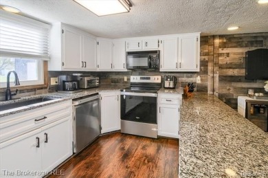 Nestled on an amazing nearly one-acre lot, this beautifully on Prairie Creek Golf Course in Michigan - for sale on GolfHomes.com, golf home, golf lot