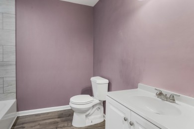 Spacious and updated, this 5-bedroom, 2-bathroom home offers 2 on IMA Brookwood Golf Course in Michigan - for sale on GolfHomes.com, golf home, golf lot