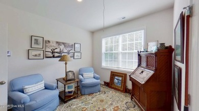Tucked away on a quiet street, this elegant one-owner home on Carolina Colours Golf Club in North Carolina - for sale on GolfHomes.com, golf home, golf lot