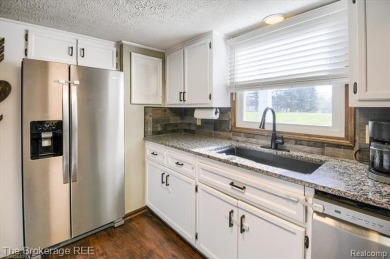 Nestled on an amazing nearly one-acre lot, this beautifully on Prairie Creek Golf Course in Michigan - for sale on GolfHomes.com, golf home, golf lot