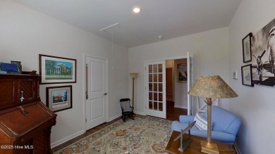 Tucked away on a quiet street, this elegant one-owner home on Carolina Colours Golf Club in North Carolina - for sale on GolfHomes.com, golf home, golf lot