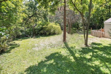Spacious and updated, this 5-bedroom, 2-bathroom home offers 2 on IMA Brookwood Golf Course in Michigan - for sale on GolfHomes.com, golf home, golf lot