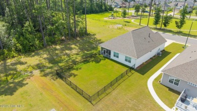 Tucked away on a quiet street, this elegant one-owner home on Carolina Colours Golf Club in North Carolina - for sale on GolfHomes.com, golf home, golf lot