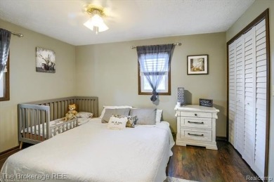 Nestled on an amazing nearly one-acre lot, this beautifully on Prairie Creek Golf Course in Michigan - for sale on GolfHomes.com, golf home, golf lot